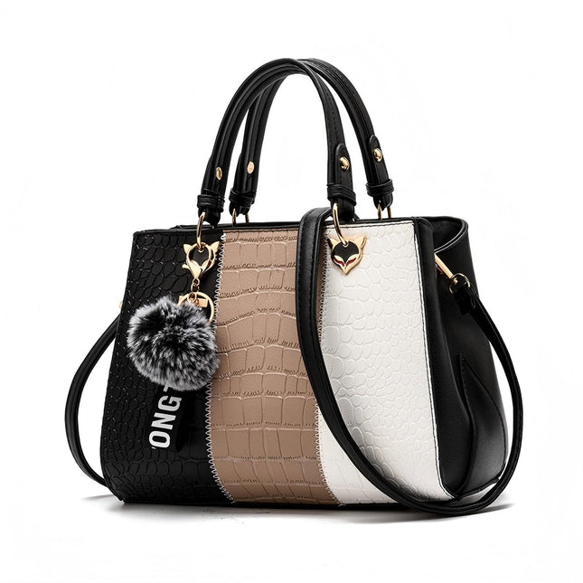 A women's handbag featuring a wave pattern with contrast colors, with a black faux leather handle and gold-tone hardware. The bag has a multicolor design and includes a decorative ball on the handle.