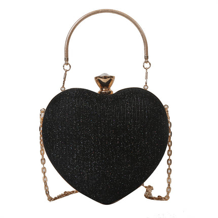 Black color heart-shaped shiny clutch bag