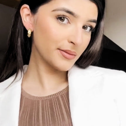 Gold celestial drop earrings with sun moon stars motif