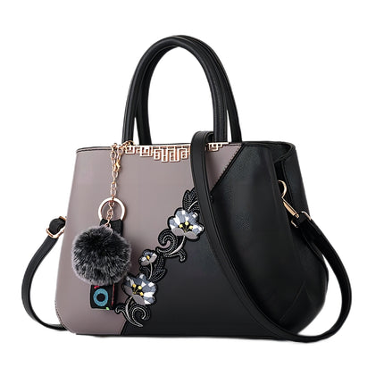 Fashionable women’s handbag with flower embroidery and PU leather