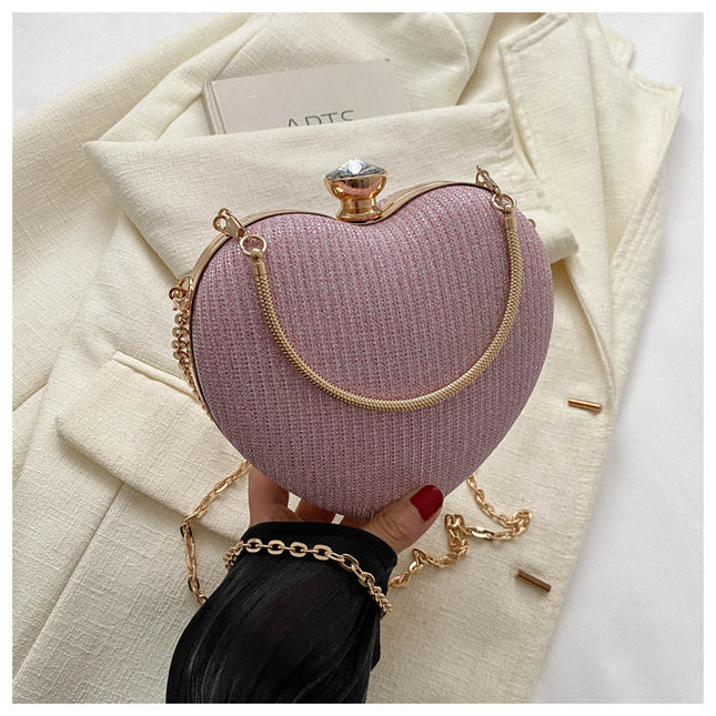 Pink color heart-shaped evening clutch bag for women