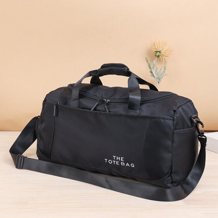Large black gym tote bag fully packed showing spacious interior and compartments