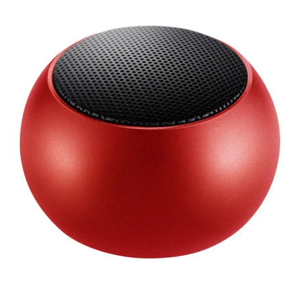 Small Bluetooth speaker in hand showing compact size
