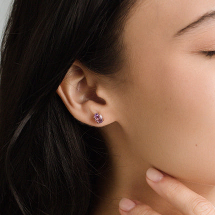 Oval cut amethyst stud earrings