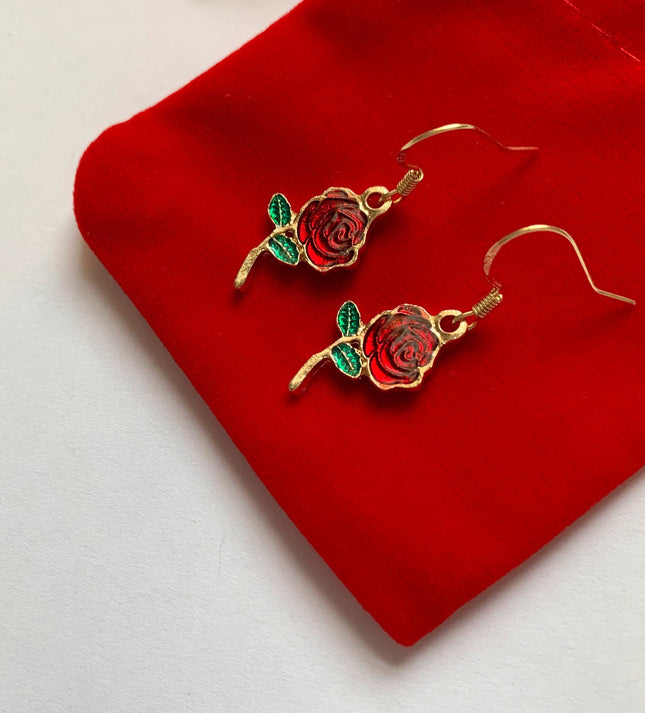 Red and green enamel dangle earrings in rose gold