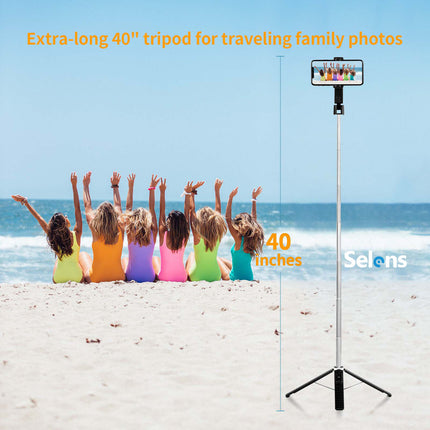 Wireless selfie stick tripod capturing scenic photo outdoors