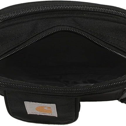 Interior of small black shoulder bag showing dual compartments and pockets