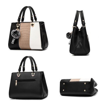 Women handbag carried by hand with top handle