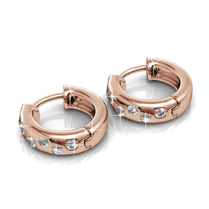 Women’s gold hoop earrings with crystals